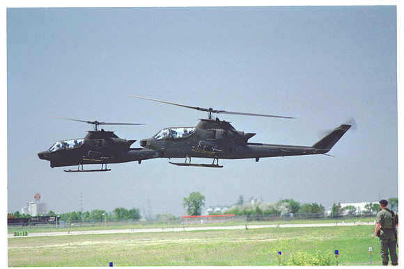 f20 AH-1 Cobra port side in air