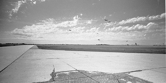 i12 Blue Angels cross over Hector Field