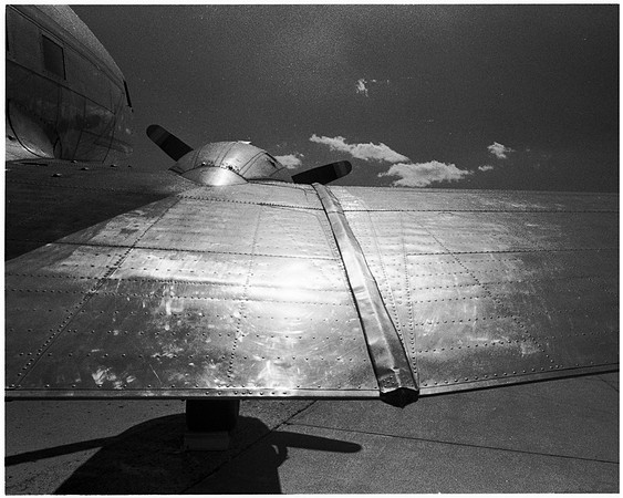 1086.21a1 C-47 behind starboard wing