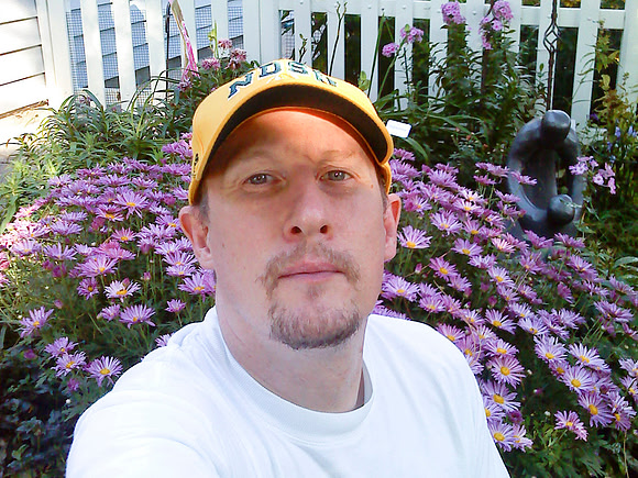 Self Portrait By Flowers
