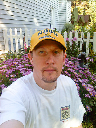 Self Portrait By Flowers