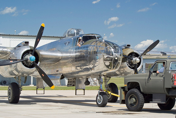 Tow Truck Pushes B-25 In Place