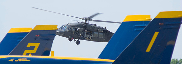 Blackhawk Hovers Over Blue Angel Team