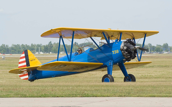 Stearman Taxis On The Grass