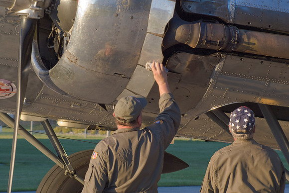 Crew Cleans Cowling