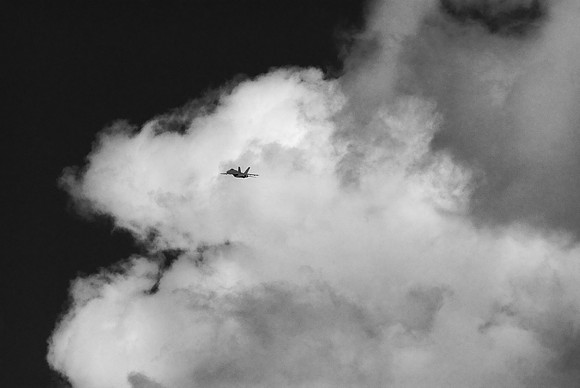 Speck In The Clouds