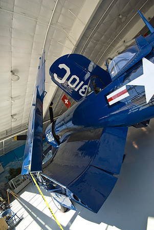 F4U Corsair Curled Against The Roof
